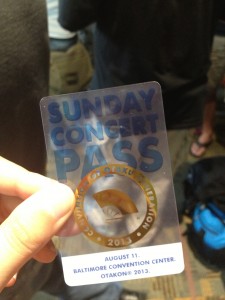 A clear card that reads "Sunday Concert Pass"