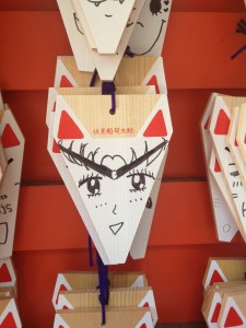 Sailor Moon's face is drawn on a fox wooden panel at Fushimi Inari