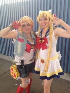 A punk sailor moon and a super sailor moon pose for the camera