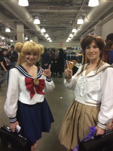 School girl Usagi and Makoto who poses with her transformation stick