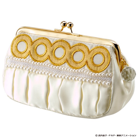 a white make up bag with princess serenity pearls and gold circles