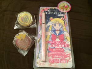 Two paper clips of Chibi Moon's brooches and the brown sailor moon eyeliner