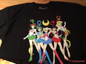 A black t-shirt with the 5 sailor guardians on it