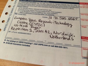 A package slip with the address of the European Space Agency written on it