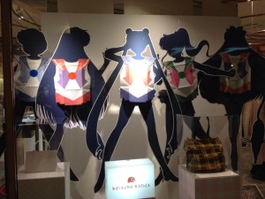cardboard silhouettes of the 5 sailor senshi with the paper aprons