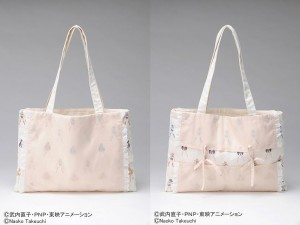 a cream colored hand bag with small sailor moon images