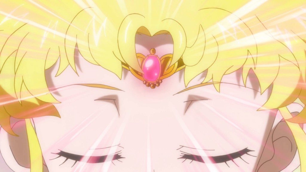 Close up of Sailor Moon's forehead. It's her second tiara.
